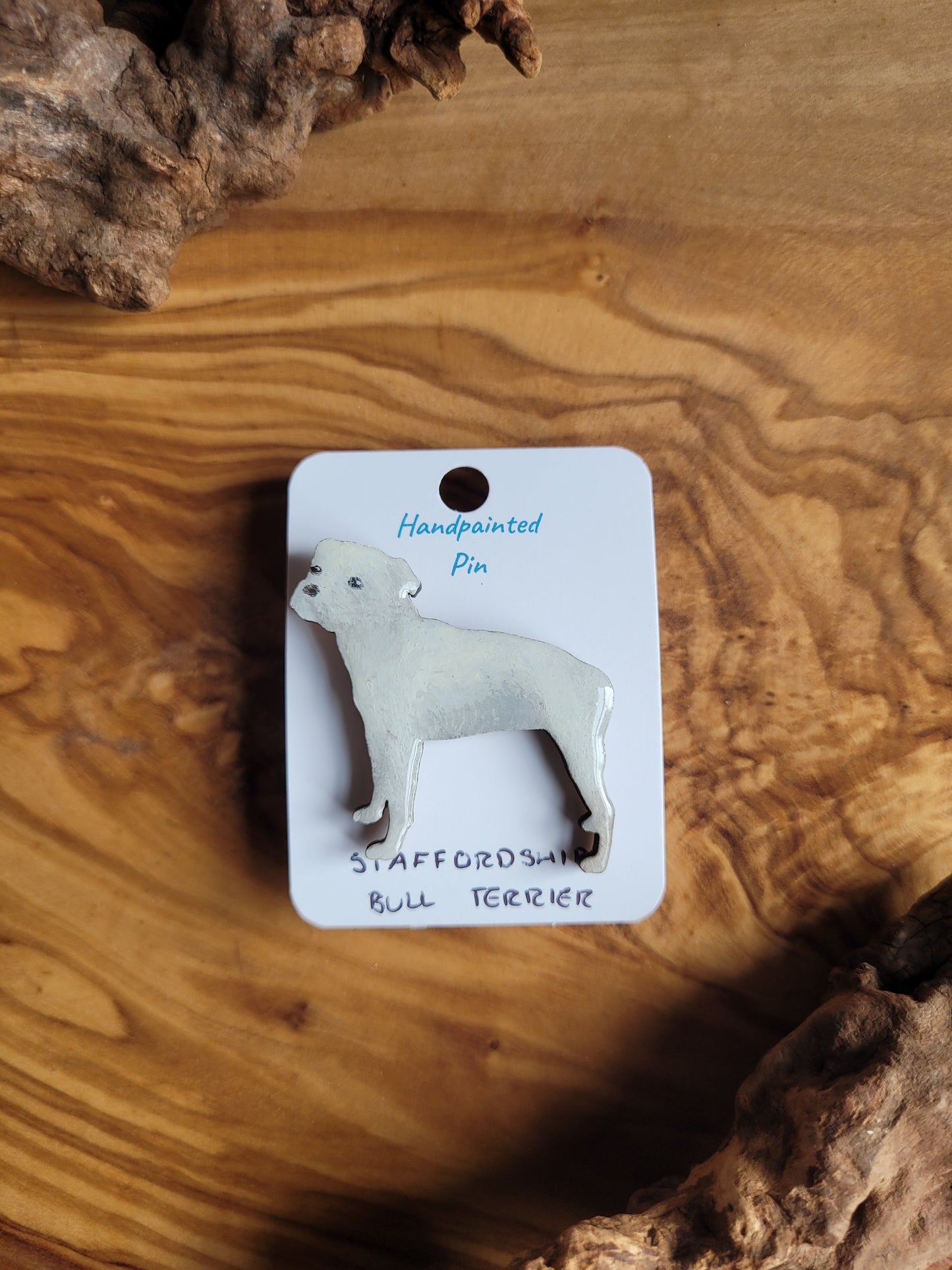 Hand-painted staffordshire bull terrier dog pin badge, painted onto wood. White colour