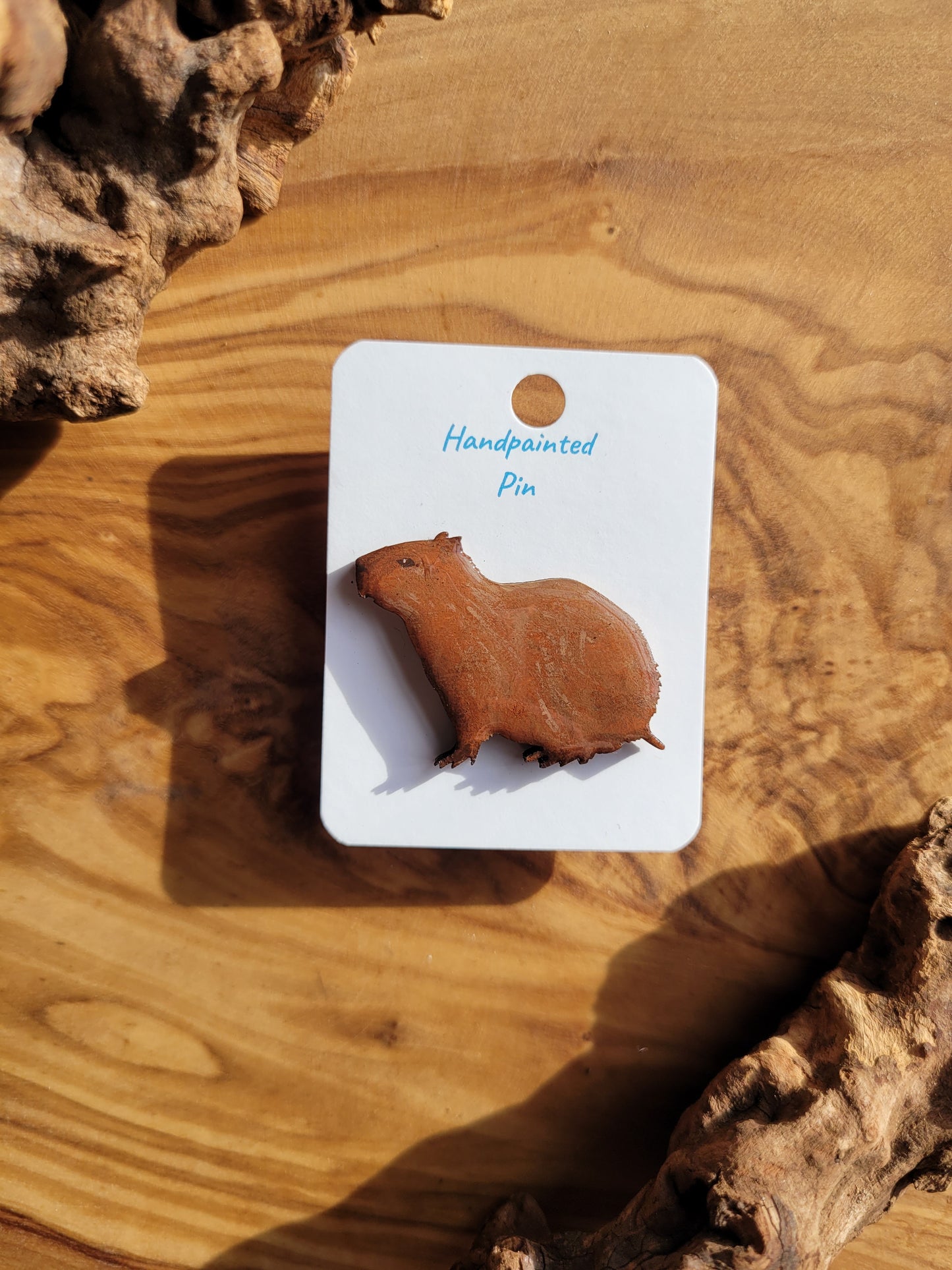 Hand-painted capybara wooden pin badge