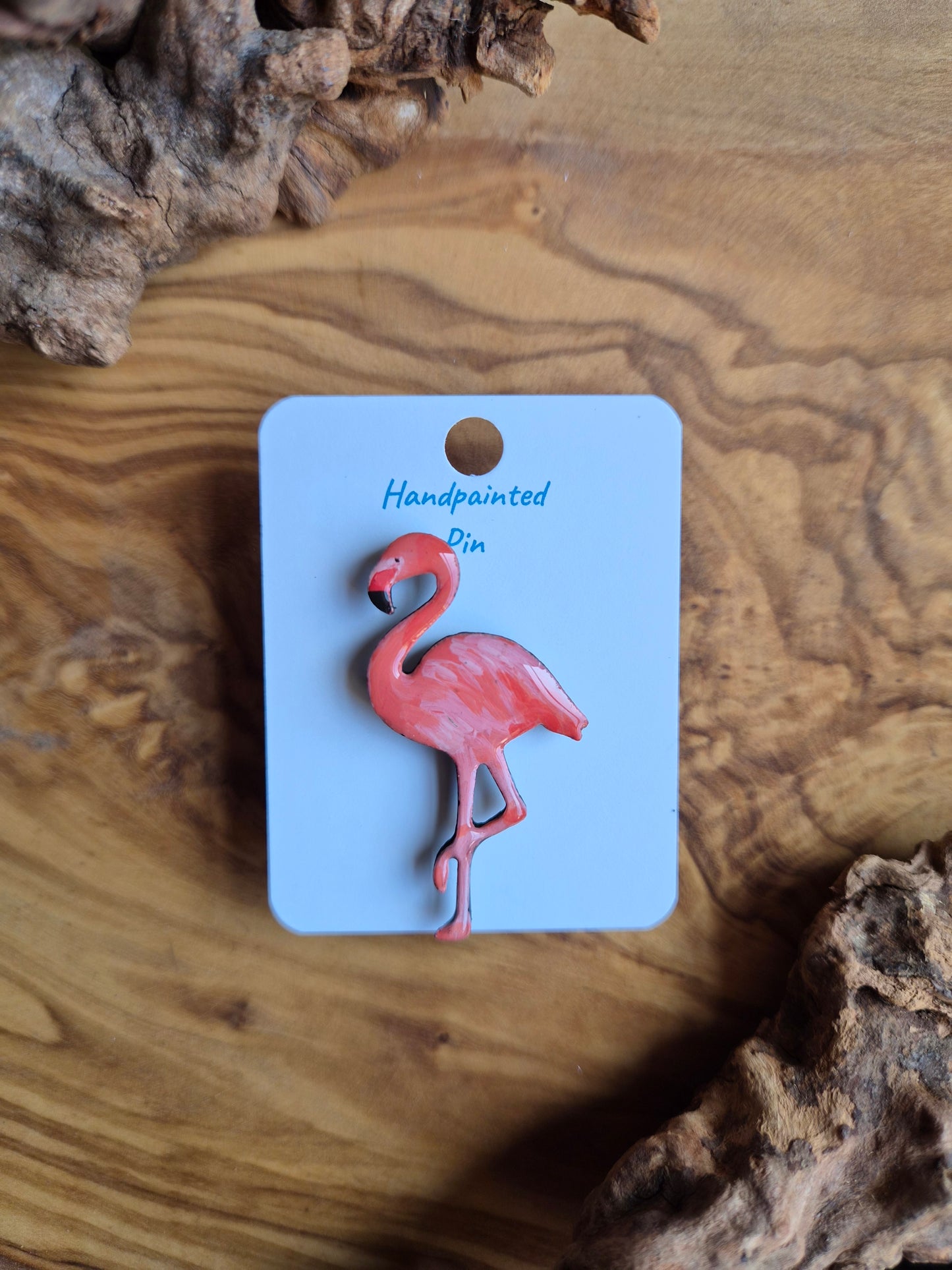 Hand-painted wooden pink flmaingo pin badge.