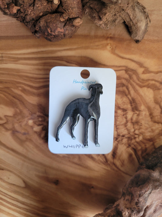 Hand-painted wooden dog pin badge of the Whippet hound. Black with white paws