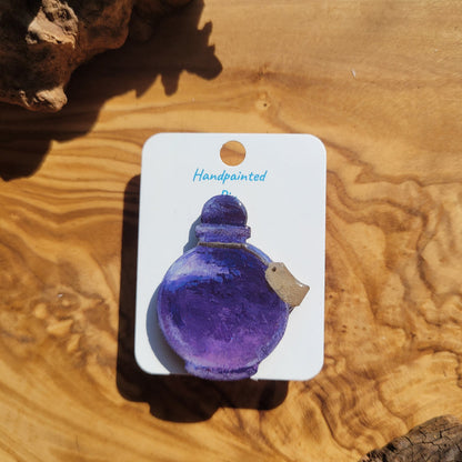 Purple handpainted potion bottle shaped pin