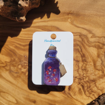 Purple handpainted mushroom potion bottle shaped pin