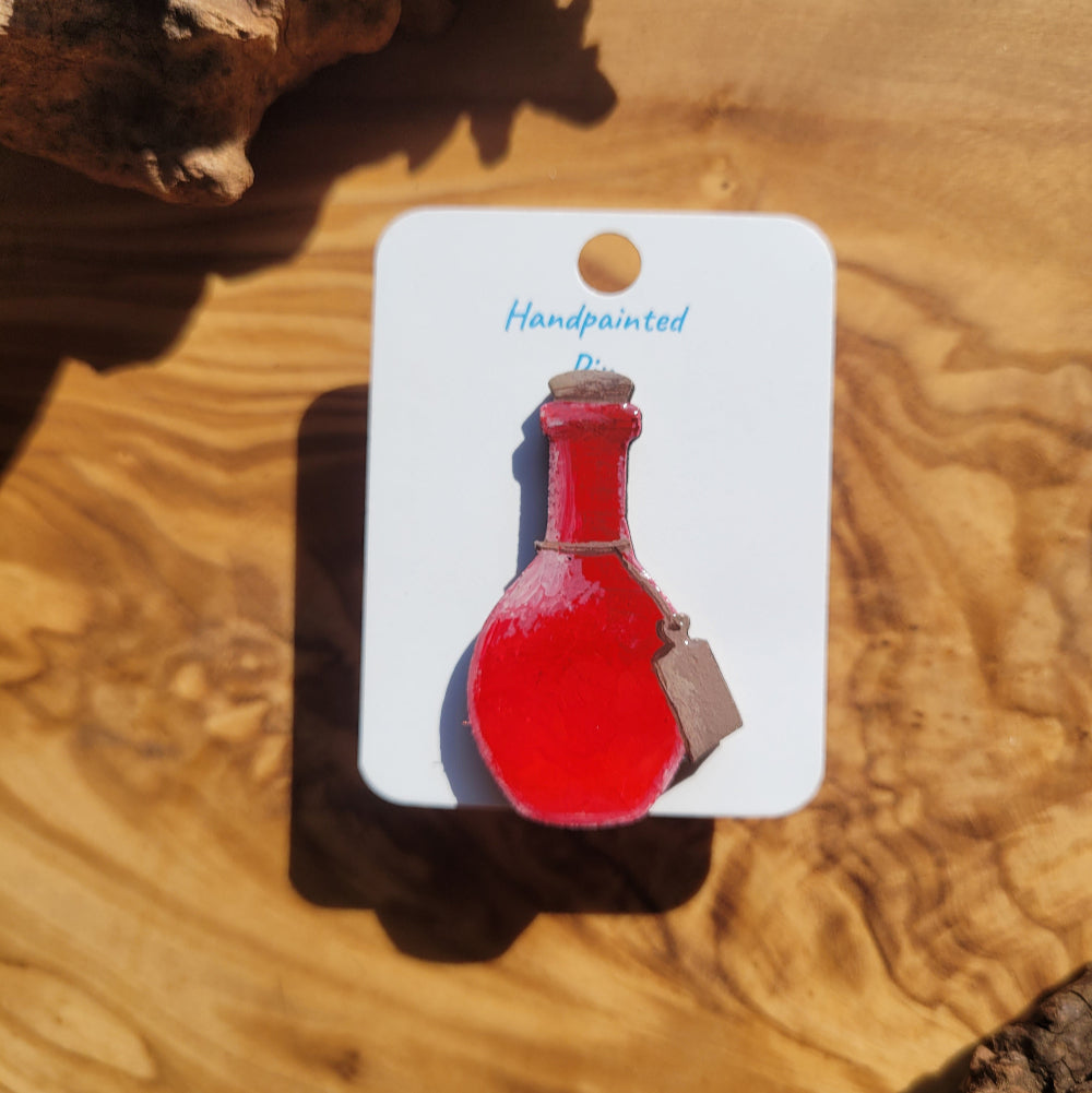 Red handpainted potion bottle shaped pin