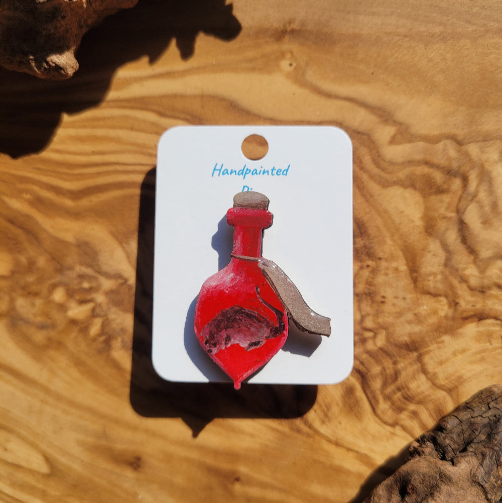 Red handpainted potion bottle shaped pin