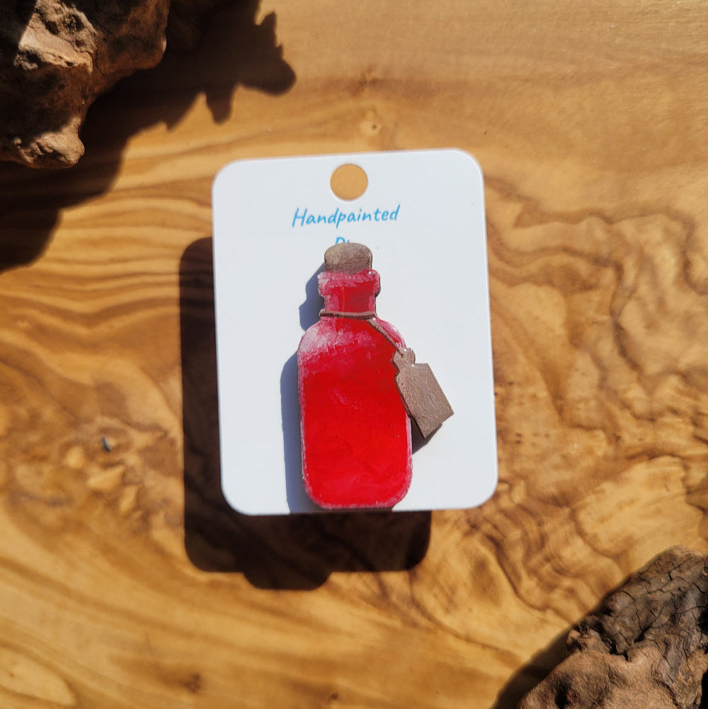 Red handpainted potion bottle shaped pin