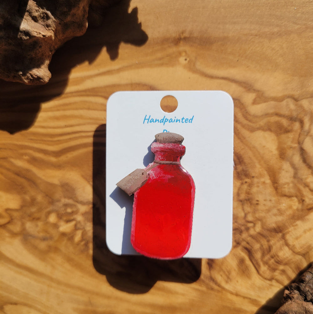 Red handpainted potion bottle shaped pin