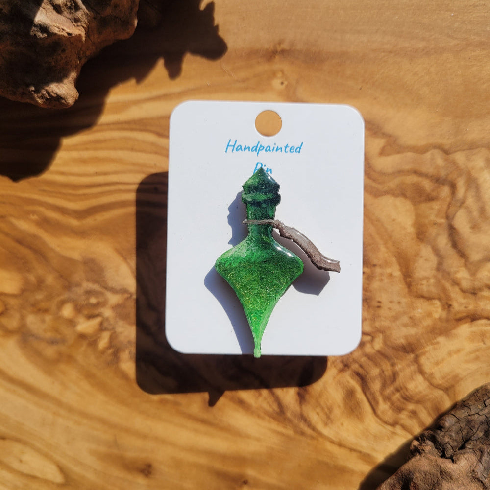 Green handpainted potion bottle shaped pin