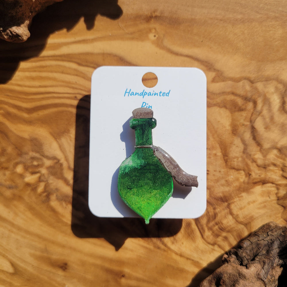 Green handpainted potion bottle shaped pin