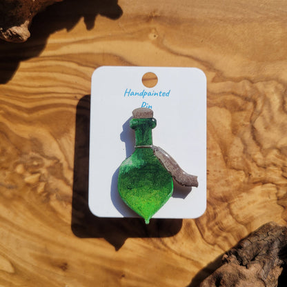Green handpainted potion bottle shaped pin