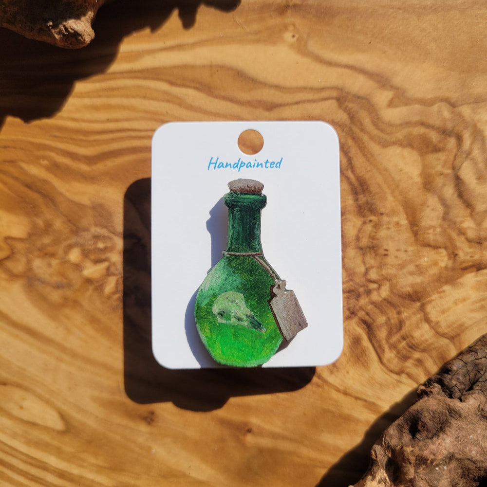 Green handpainted potion bottle shaped pin
