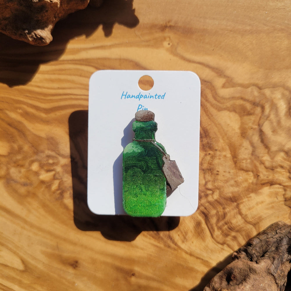Green handpainted potion bottle shaped pin