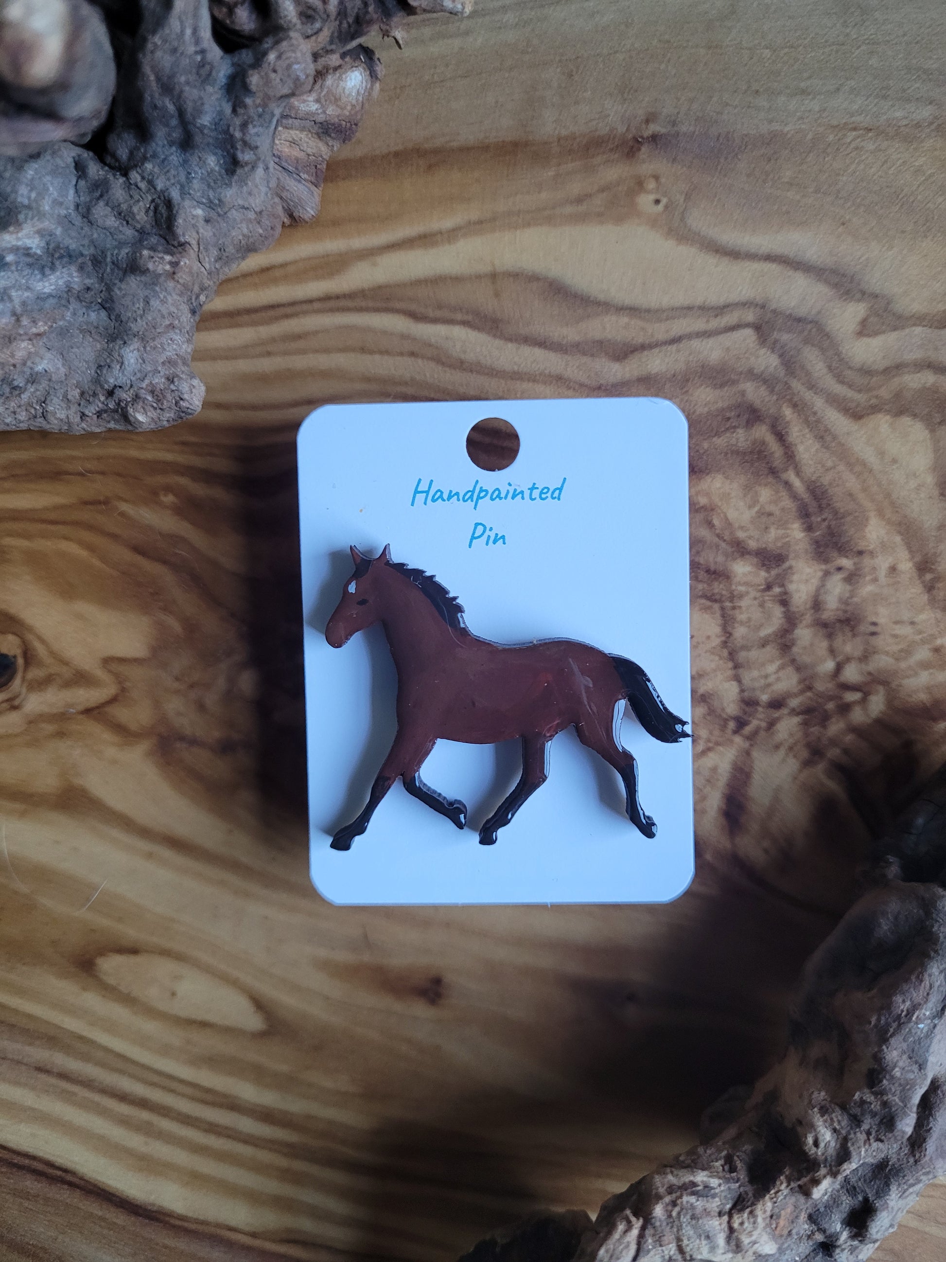 Hand-painted horse shaped wooden pin badge. Dark bay colour