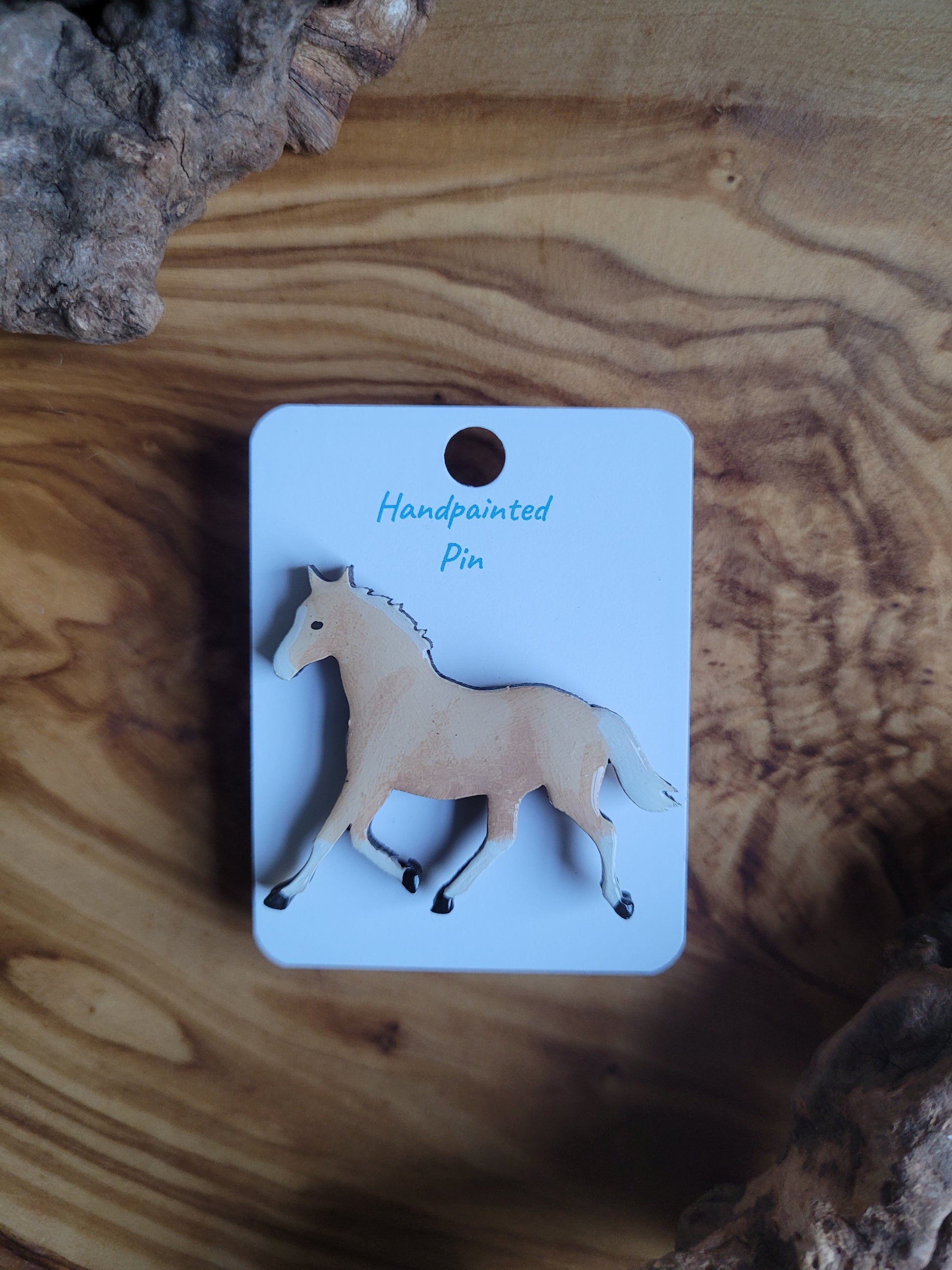 Hand-painted horse shaped wooden pin badge. Palomino and white blaze and socks colour