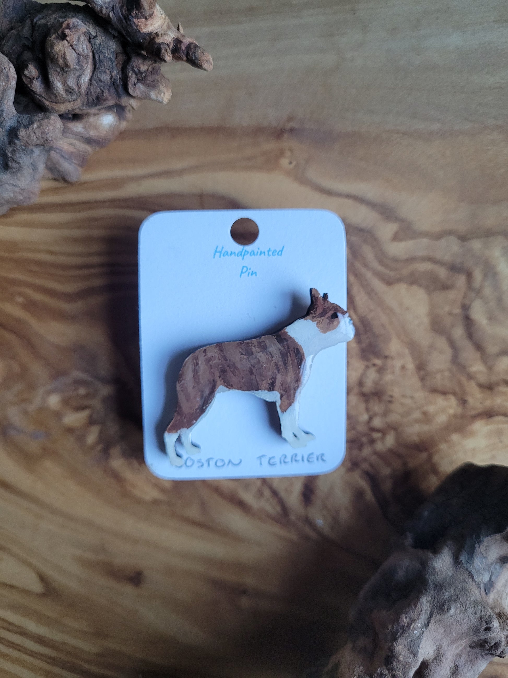 Hand-painted Wooden dog pin badge of a light Red-Brindle and white Boston Terrier 