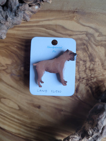 Hand-painted wooden pin badge of a fawn coloured Cane Corso dog.