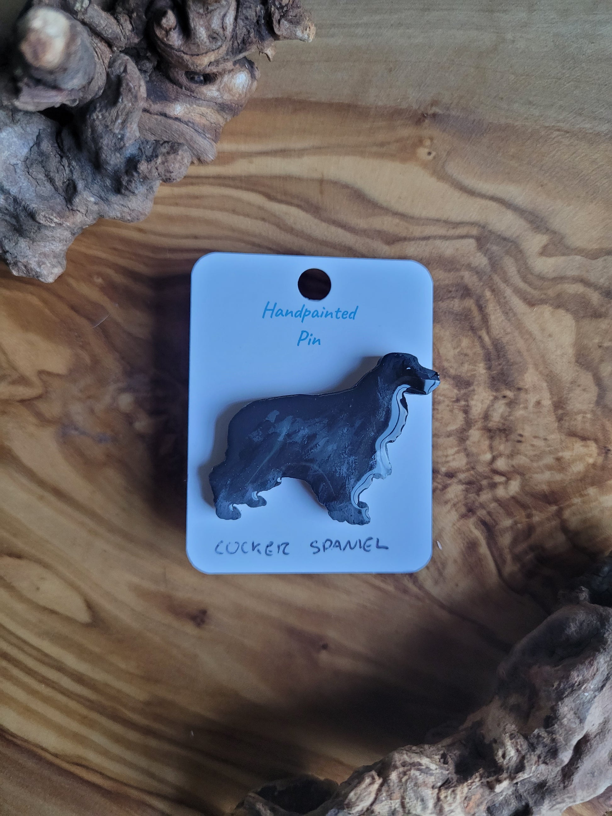 Hand-painted black and white chest coloured wooden Cocker Spaniel dog pin badge