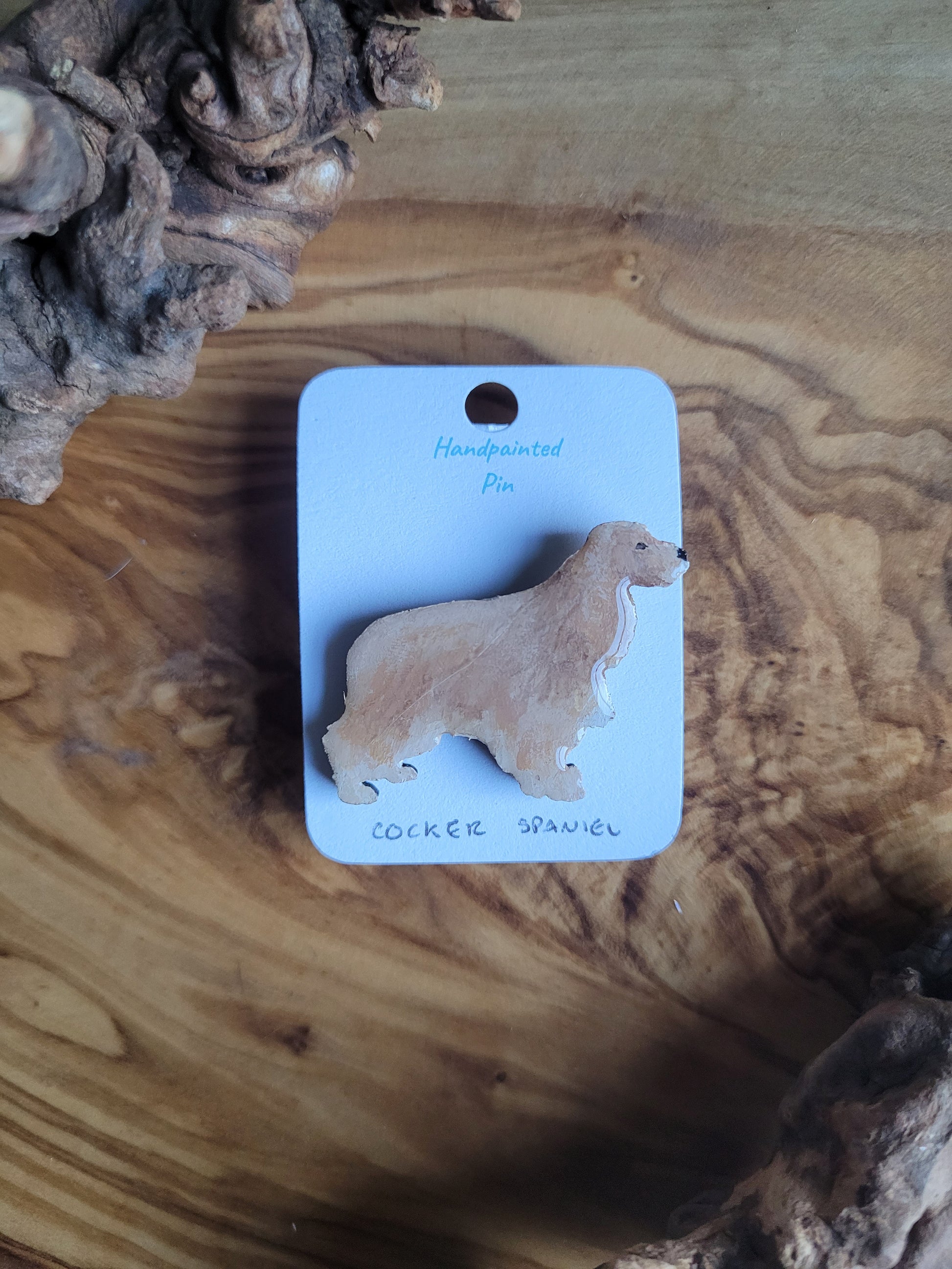 Hand-painted gold and white coloured wooden Cocker Spaniel dog pin badge