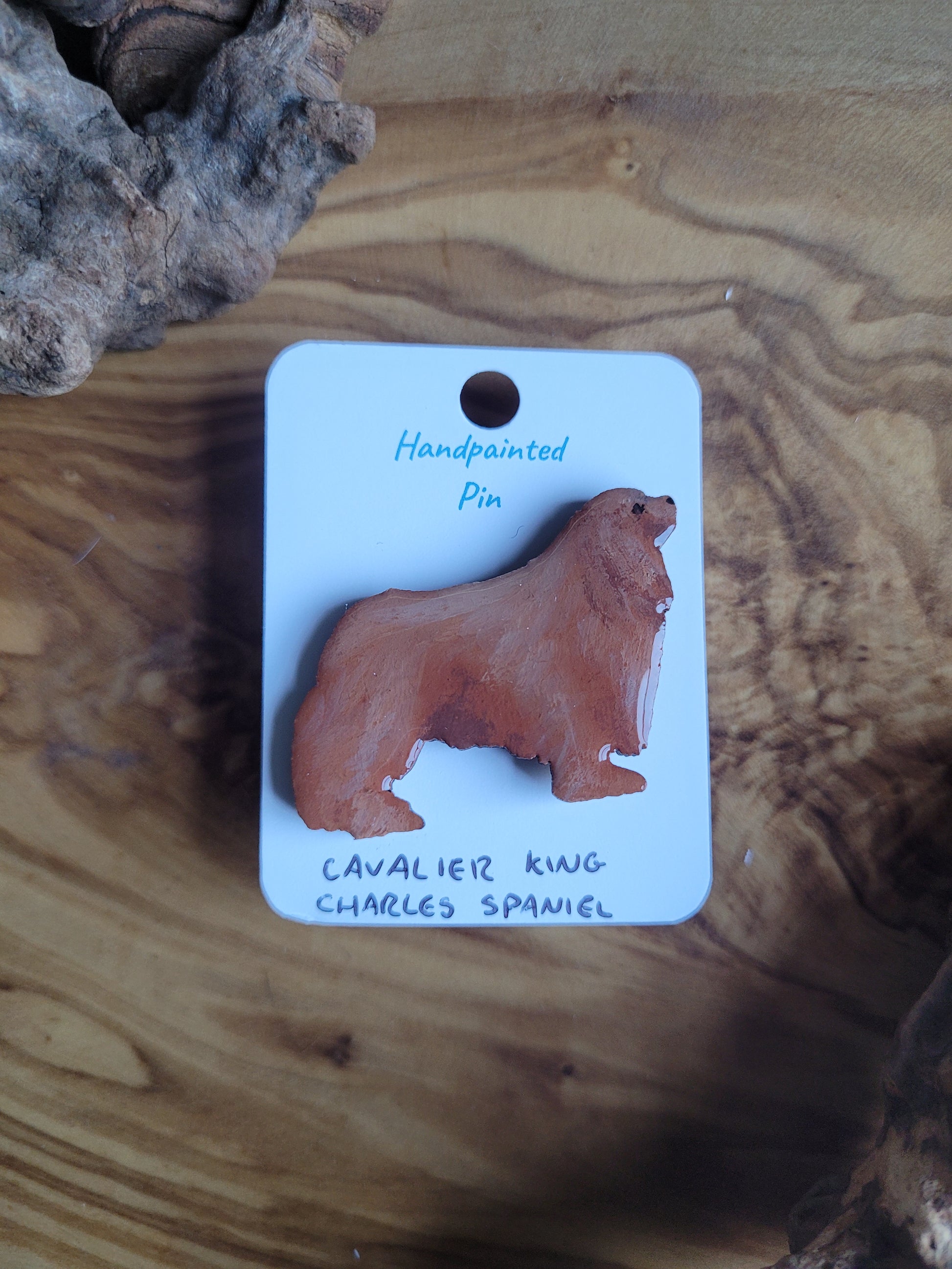 Hand-painted red coloured Cavalier King Charles Spaniel wooden pin badge