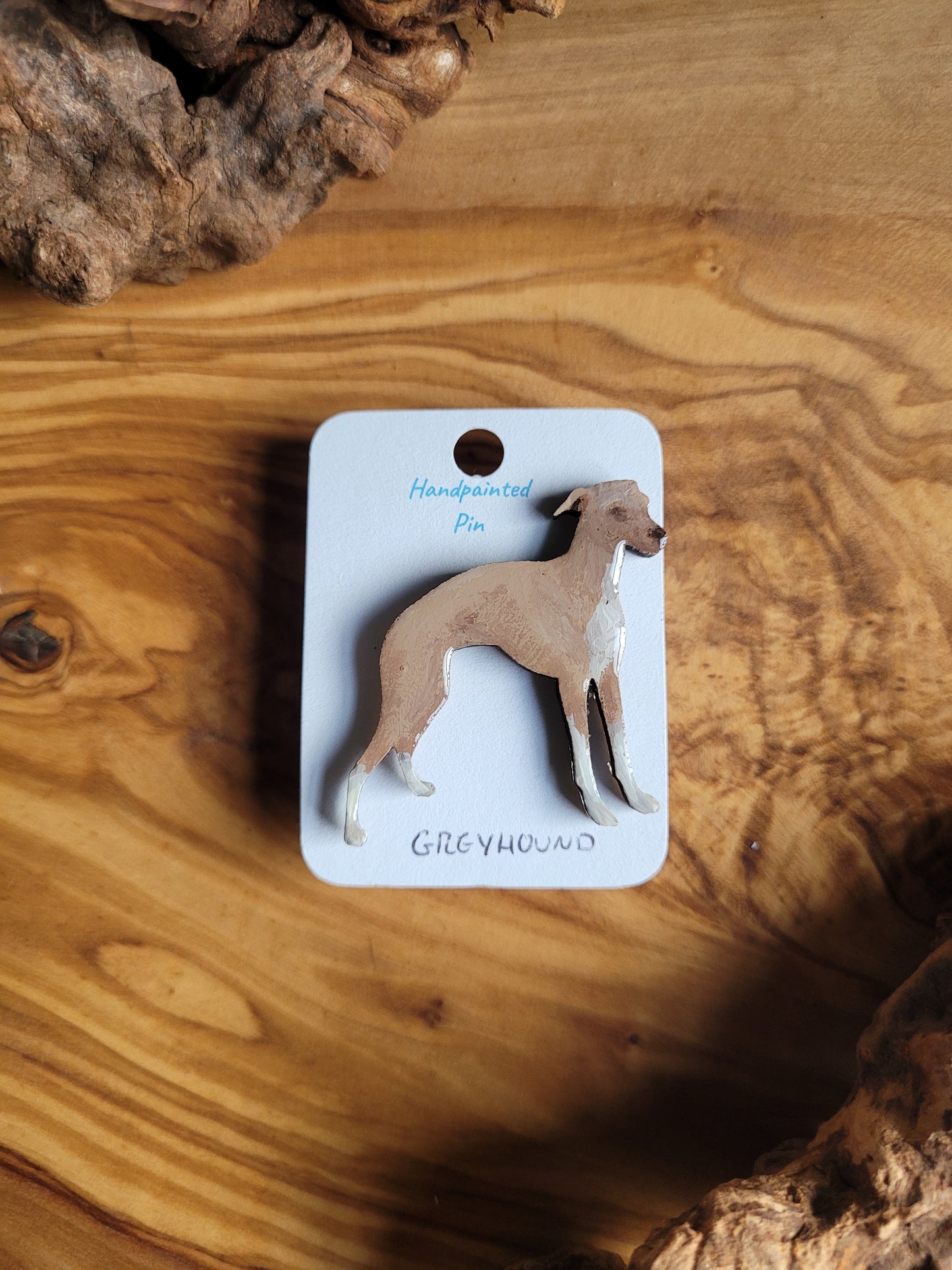 Hand-painted Greyhound pin badge, painted onto wood.  Fawn with chist chest and paws