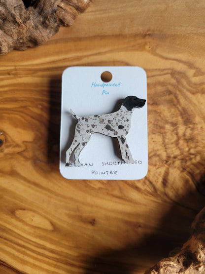 Hand-painted wooden dog pin of a German Shorthaired Pointer, white speckled with a black patch over the head