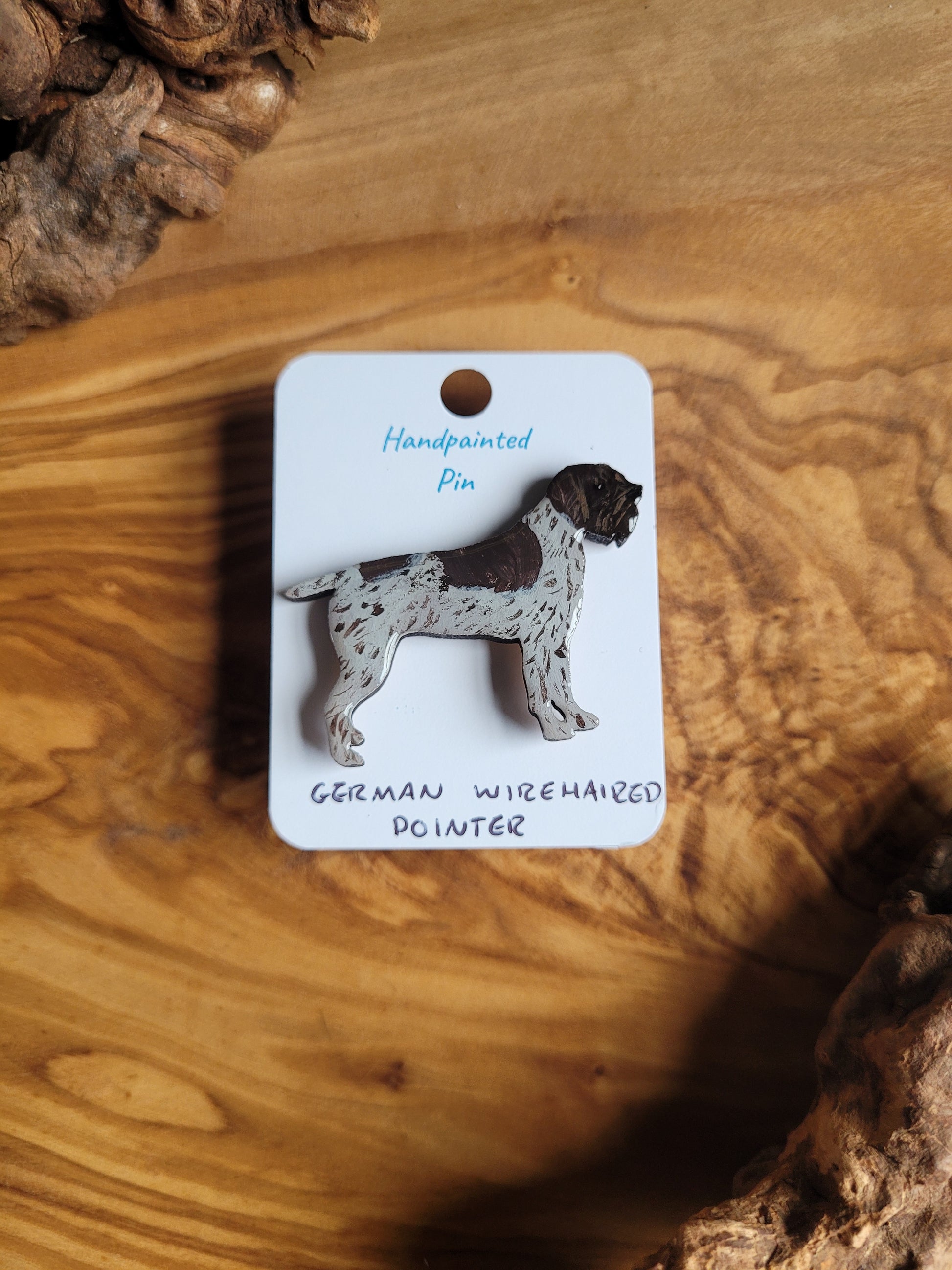 Hand-painted German Wirehaired Pointer pin badge, classic liver and white speckled with patch over the face with two patches across the back