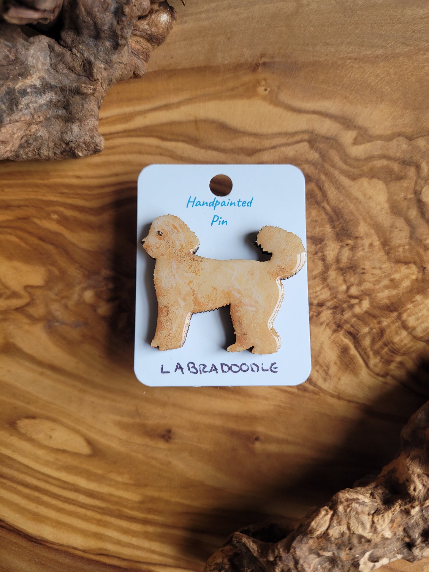 Hand-painted Labdradoodle dog pin badge, painted onto wood and golden coloured