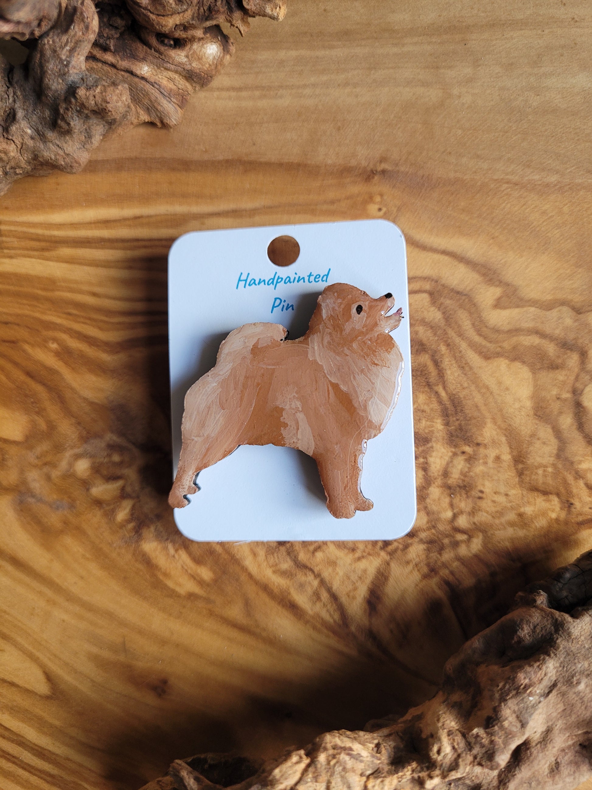 Tan coloured hand-painted Pomeranian wooden pin badge