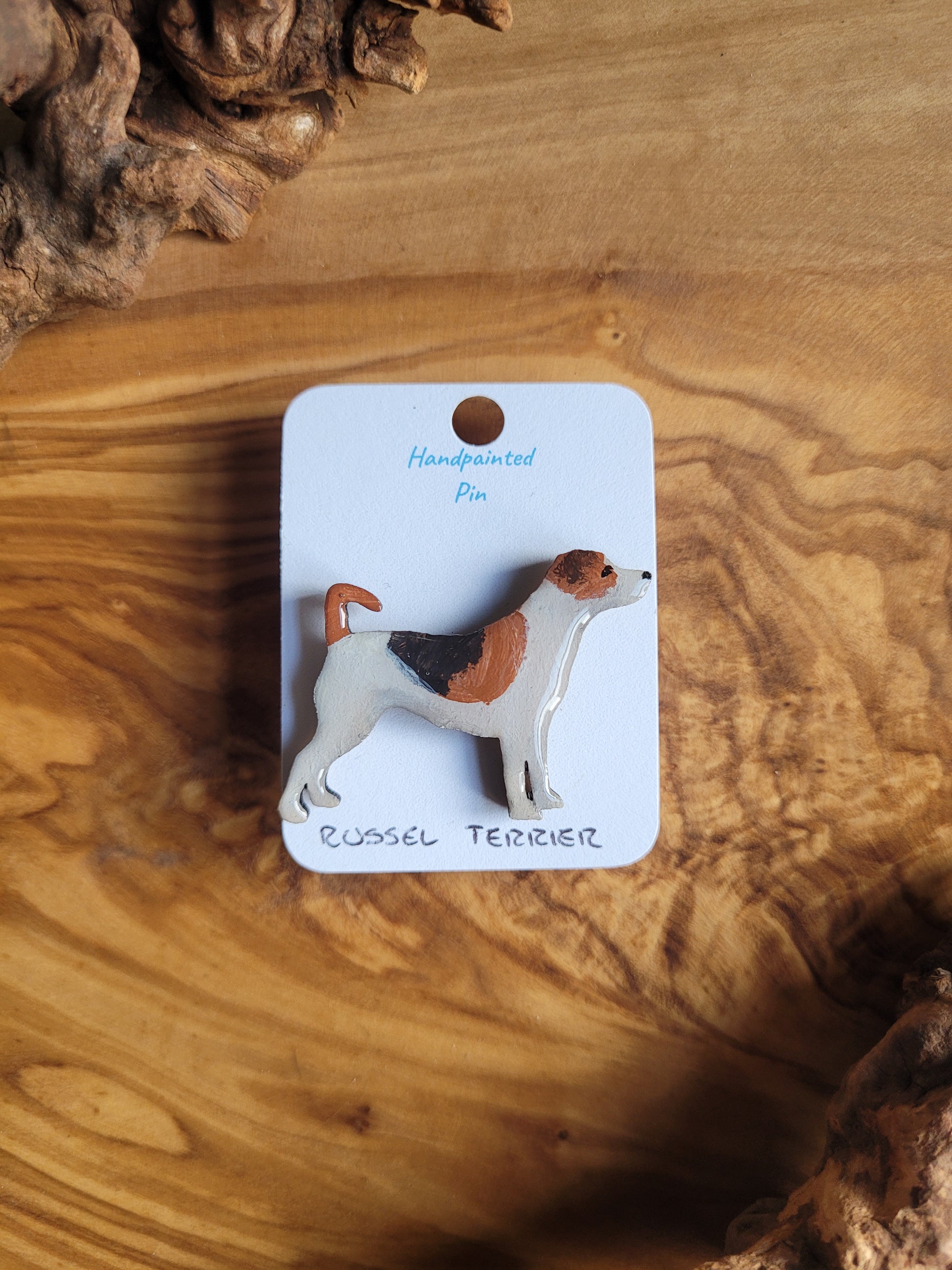 Tri Coloured, hand-painted wooden pin badge of a Russel Terrier dog