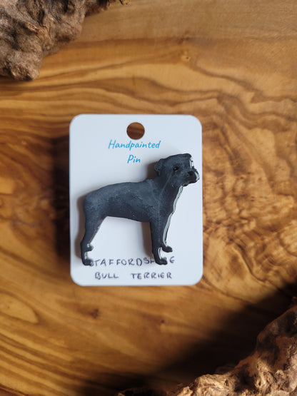 Hand-painted staffordshire bull terrier dog pin badge, painted onto wood. Blue colour