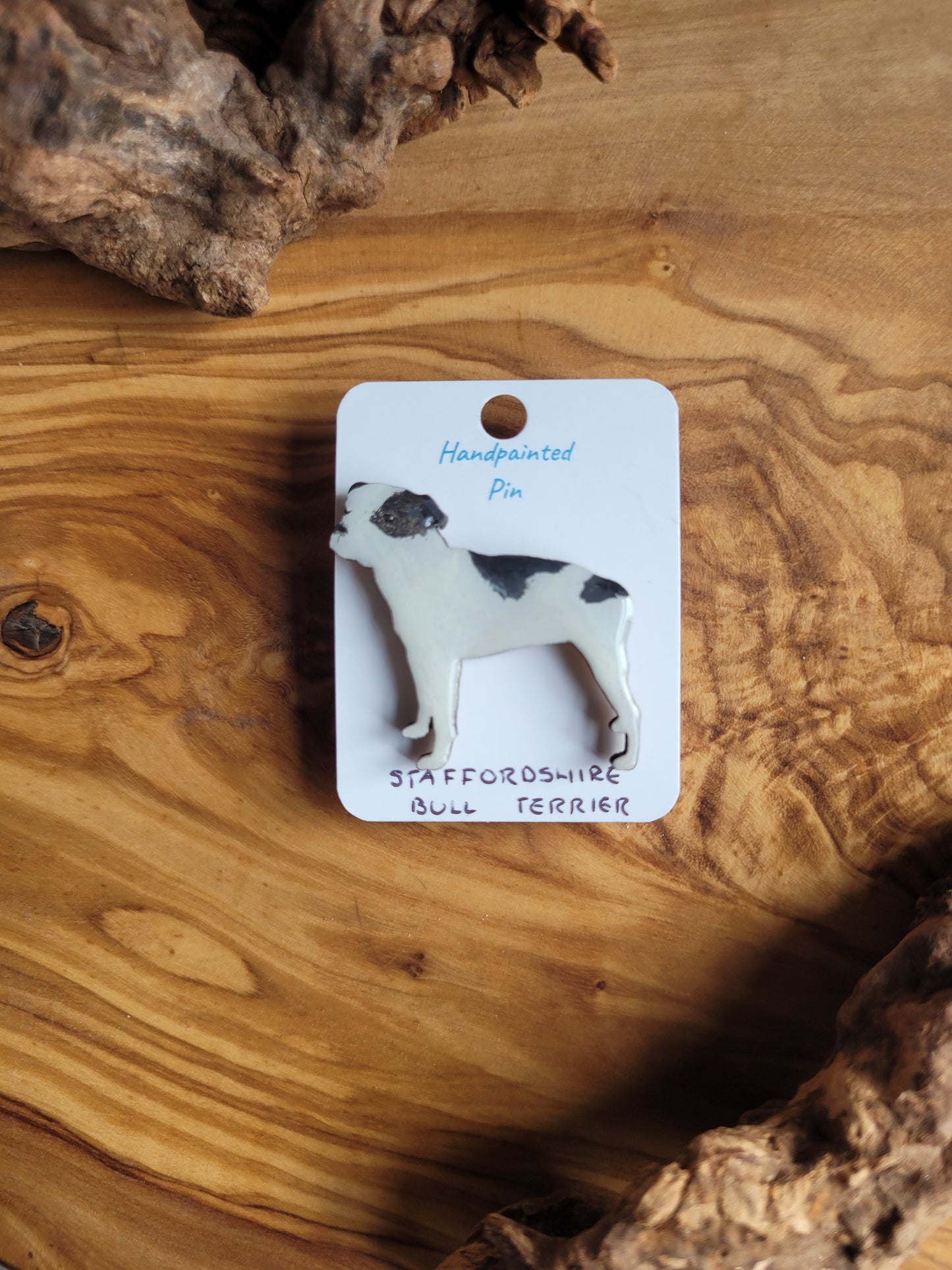 Hand-painted staffordshire bull terrier dog pin badge, painted onto wood. White with black patches colour