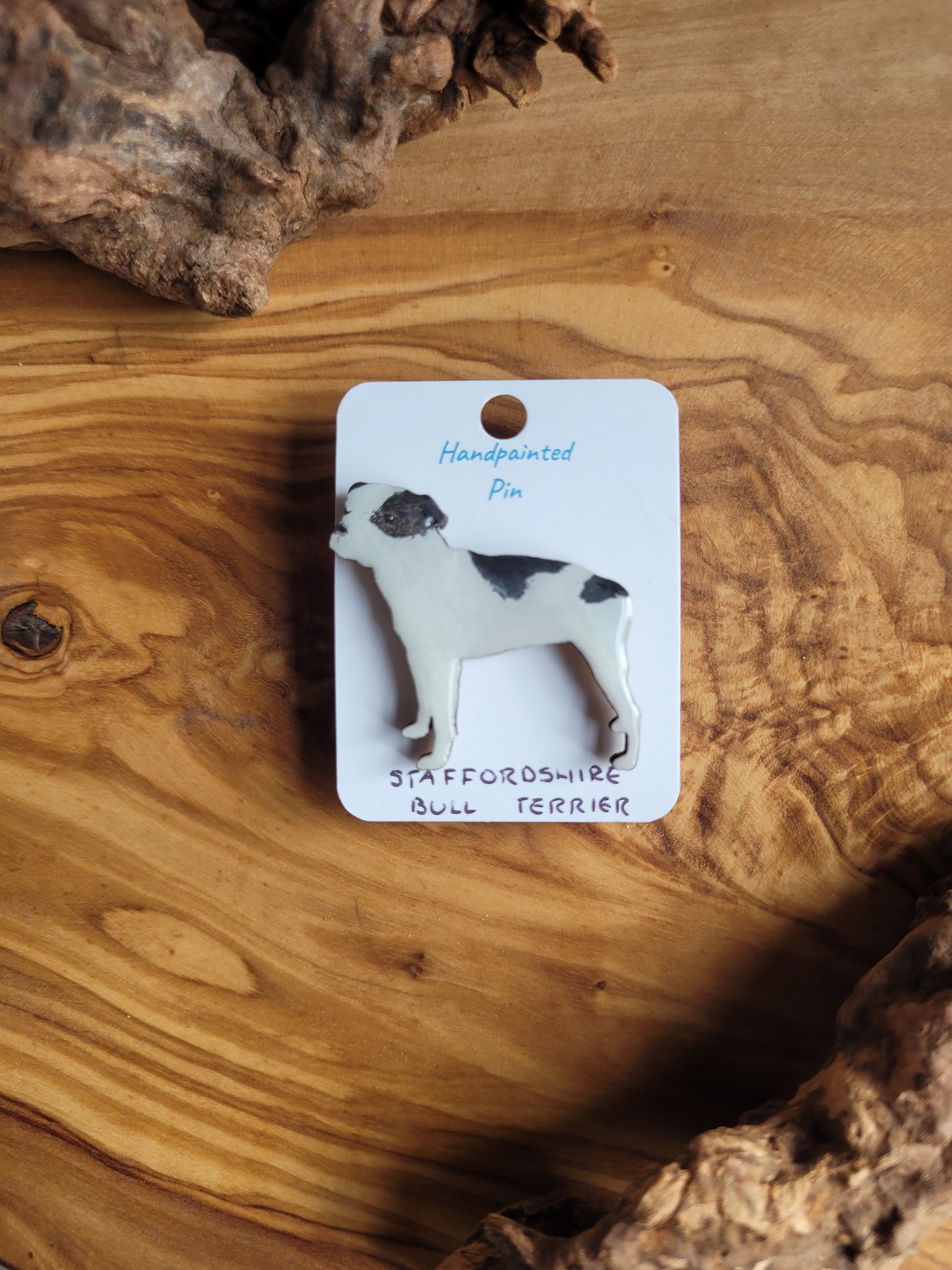Hand-painted staffordshire bull terrier dog pin badge, painted onto wood. White with black patches colour