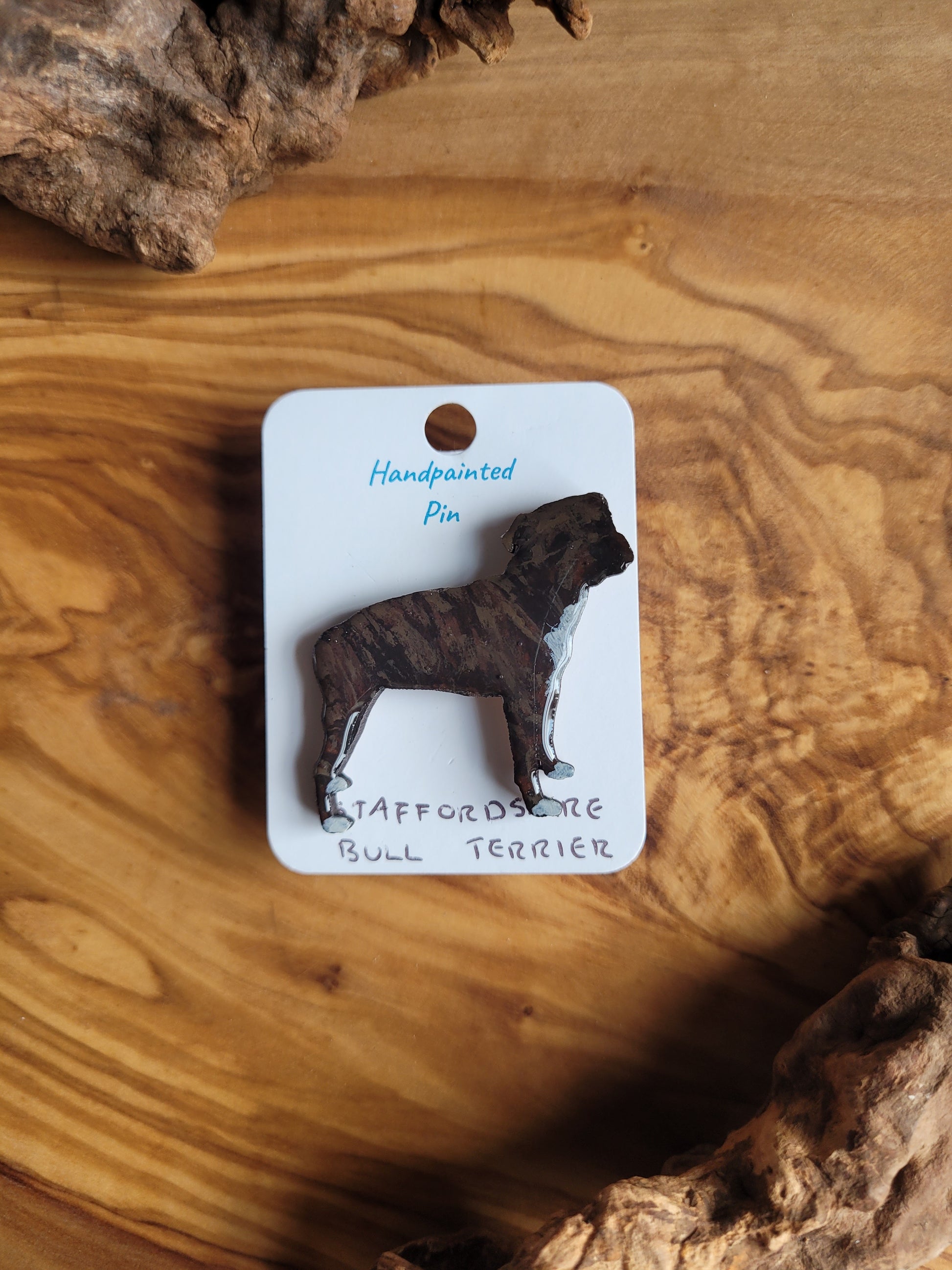 Hand-painted staffordshire bull terrier dog pin badge, painted onto wood. Brindle and white chest colour