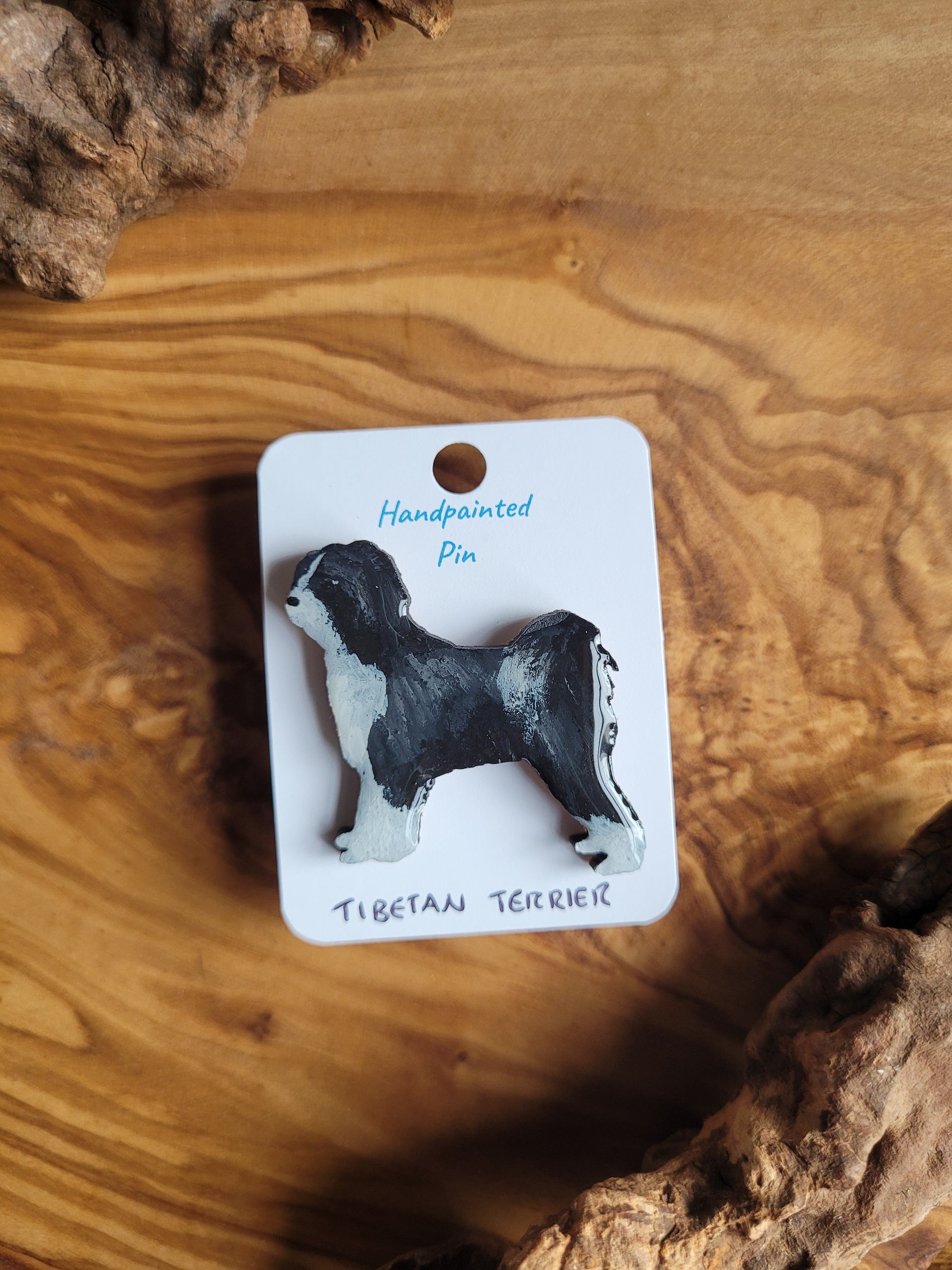 Hand-painted Tibetan terrier wooden dog pin badge. Black and white coloured terrier