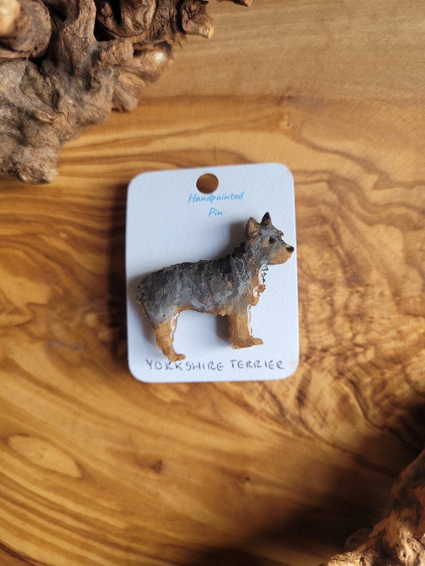 Black and tan coloured wooden dog pin badge of the Yorkshire Terrier