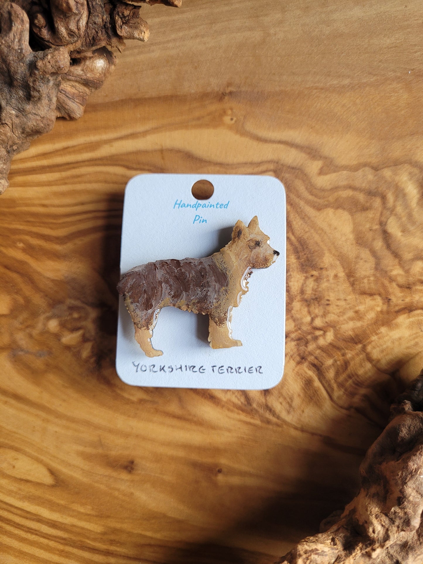 Chocolate and tan coloured wooden dog pin badge of the Yorkshire Terrier