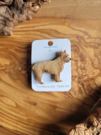 Tan coloured wooden dog pin badge of the Yorkshire Terrier
