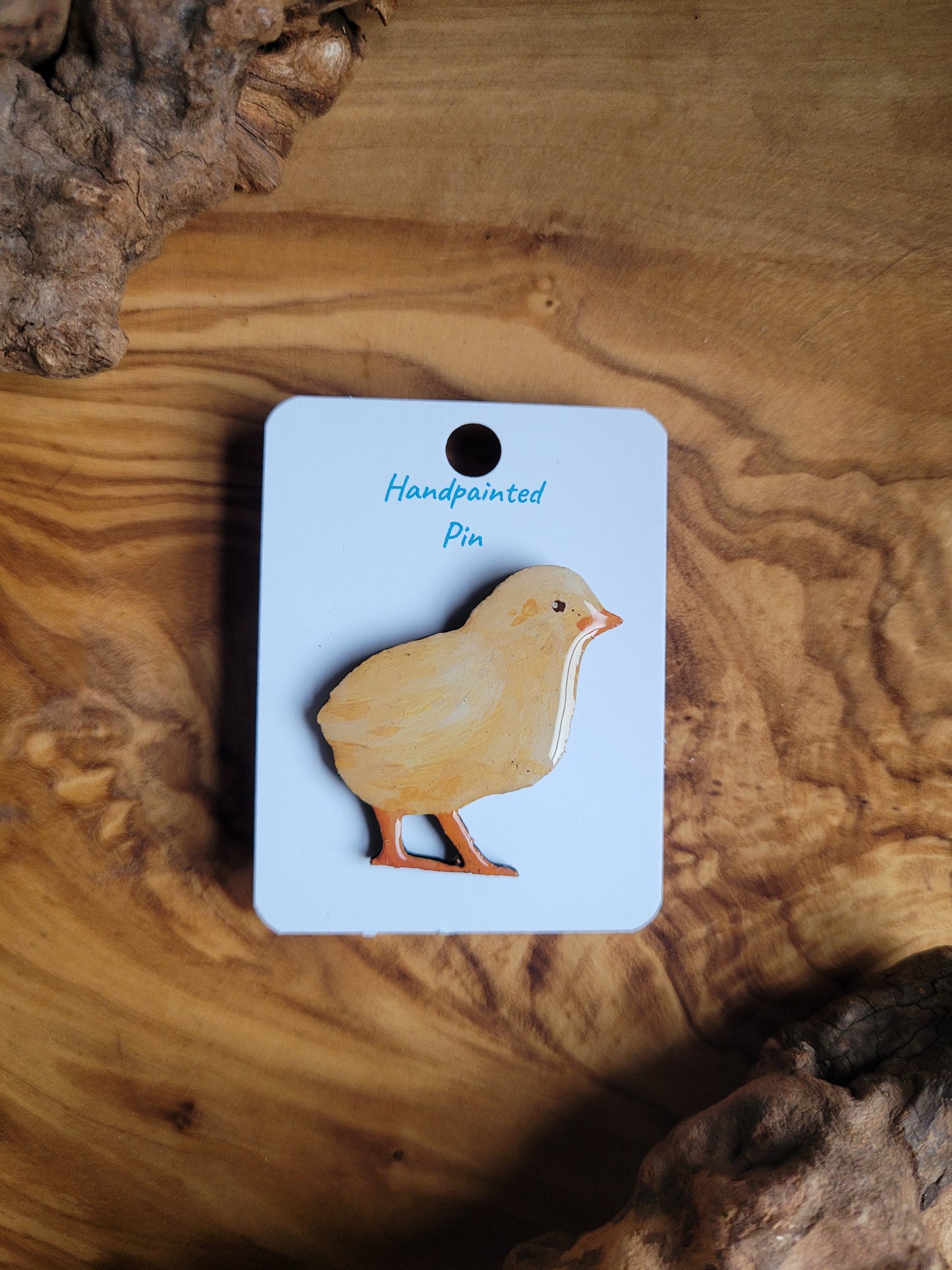 Hand-painted yellow chick shaped wooden pin badge