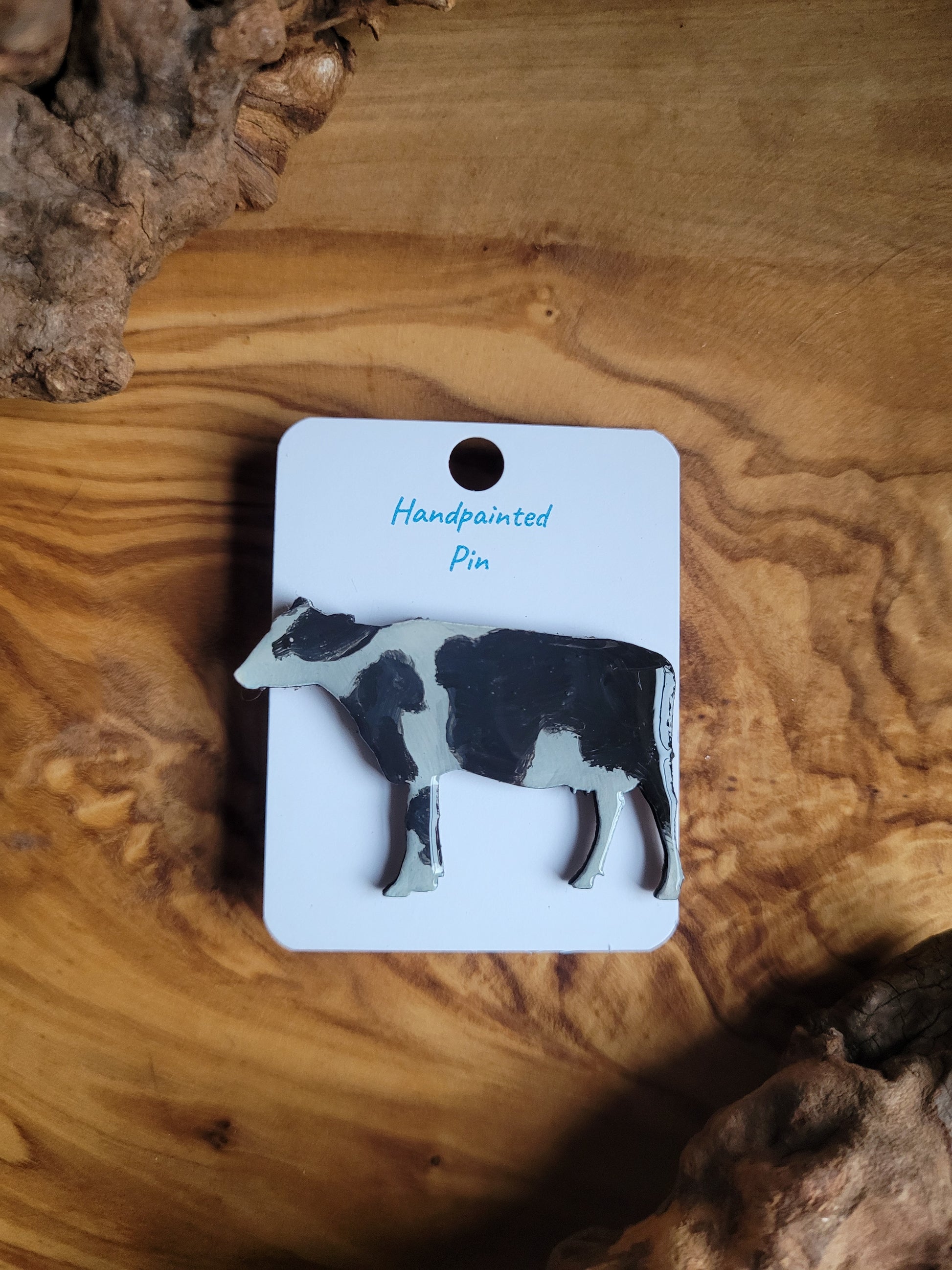 Hand-painted black and white friesian cow, wooden pin badge