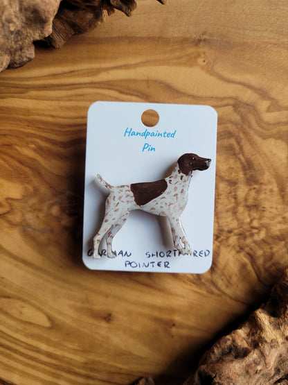 Hand-painted wooden dog pin of a German Shorthaired Pointer, white speckled with a liver patch over the head and back