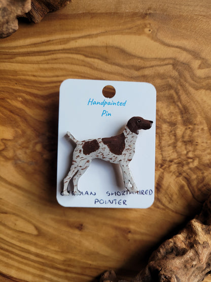 Hand-painted wooden dog pin of a German Shorthaired Pointer, white speckled with a liver patch over the head and body