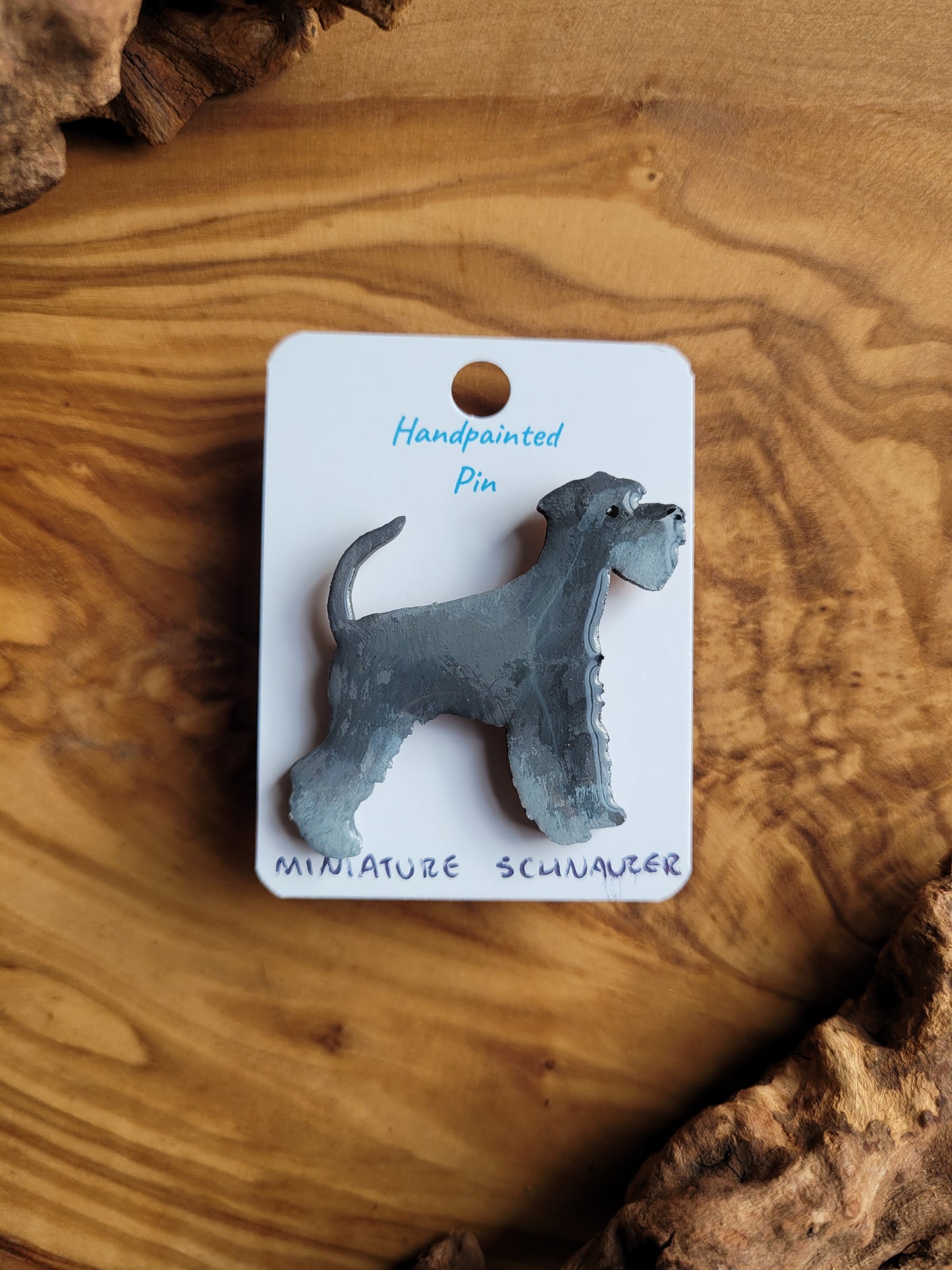 Hand-painted salt and pepper coloured Miniature Schnauzer wooden dog pin badge