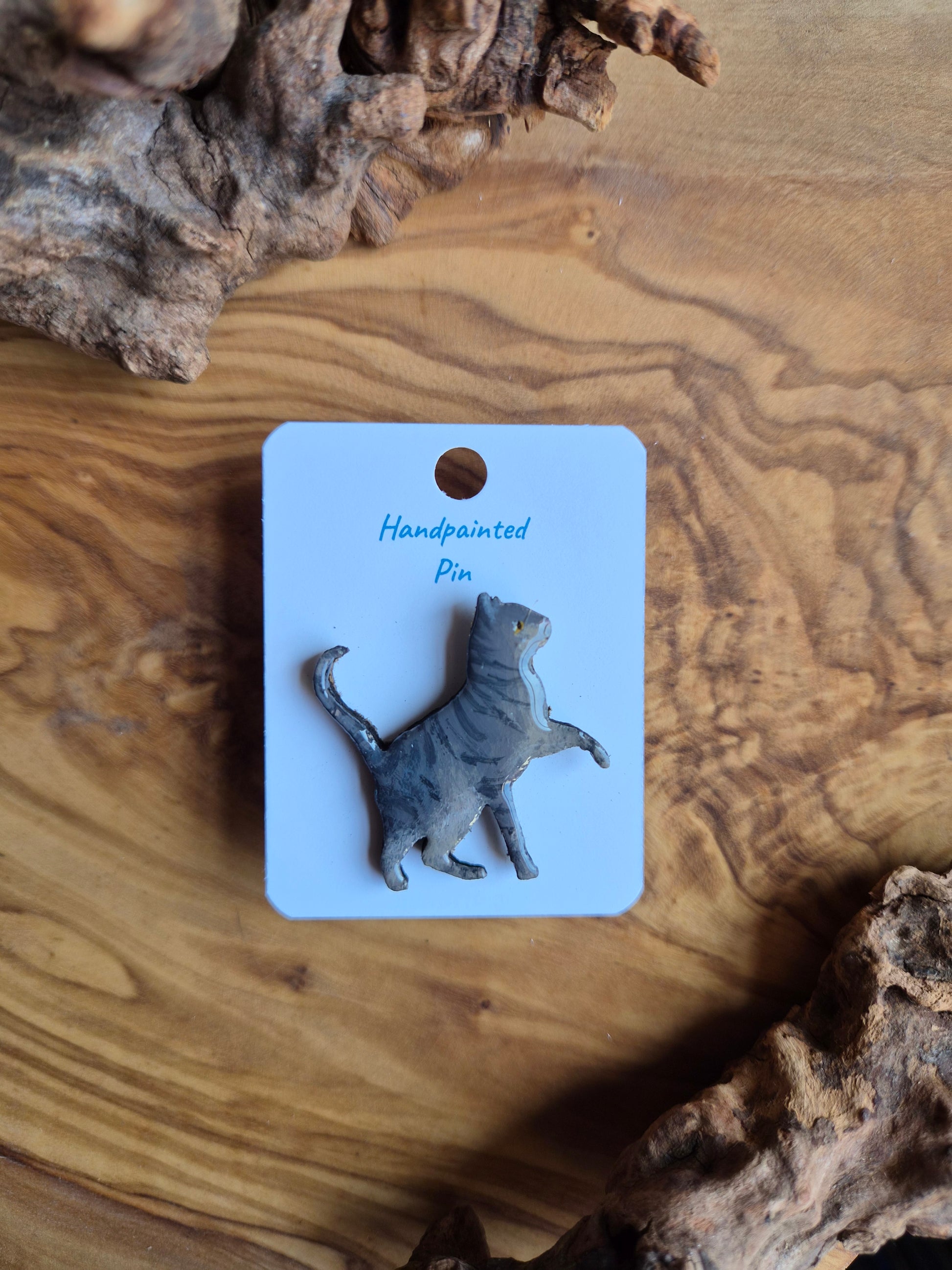 Hand-painted wooden cat pin badge. Tabby coloured cat