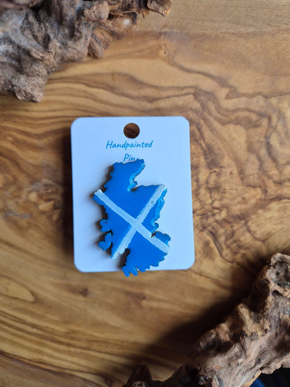 Hand-painted Scotland shaped wooden pin badge with a scottish soltaire flag painted on