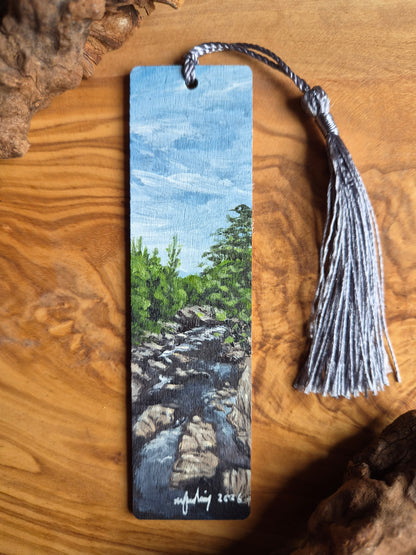 Hand-painted wooden bookmark of the river findhorn at Randolphs leap with dark powerful water and rock formations