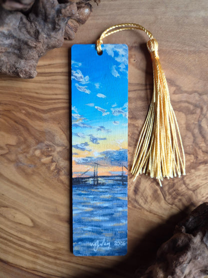 Hand-painted wooden bookmark of the iconic Forth Road Bridge with a Sunset behind