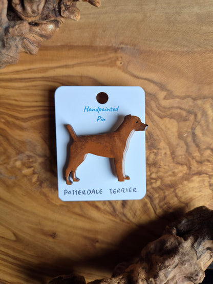 Hand-painted red patterdale terrier shaped dog pin badge, painted onto wood.