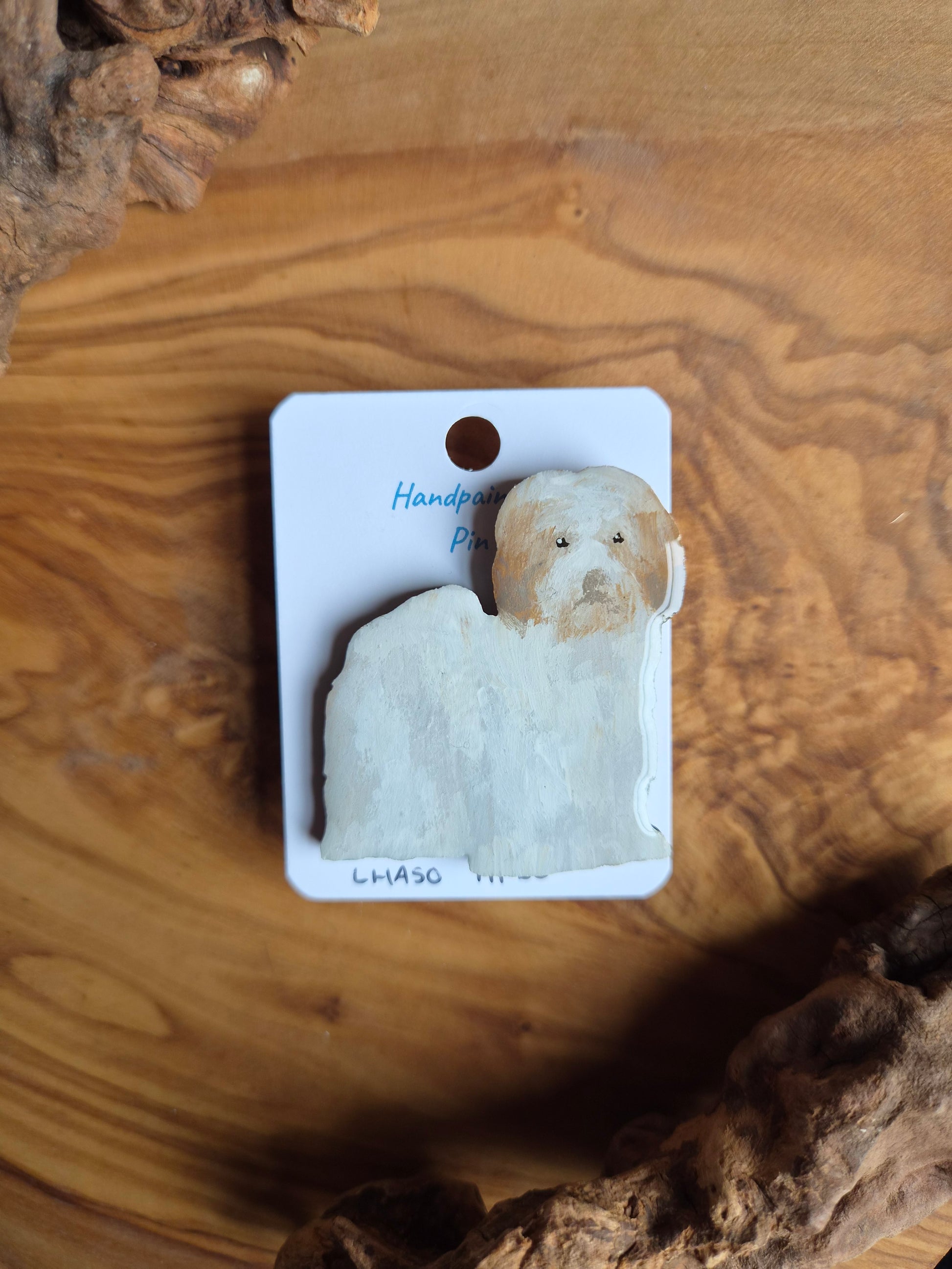 Hand-painted Lhaso Apso wooden dog pin badge. White with gold patches on the ears