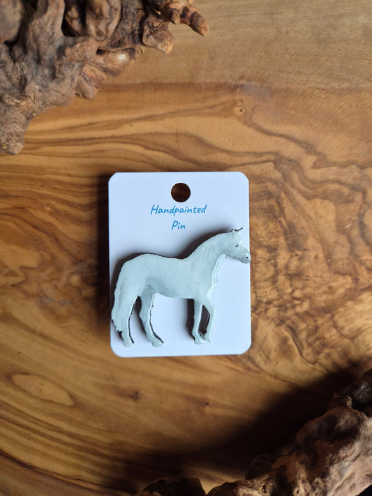 hand-painted white unicorn shaped wooden pin badge