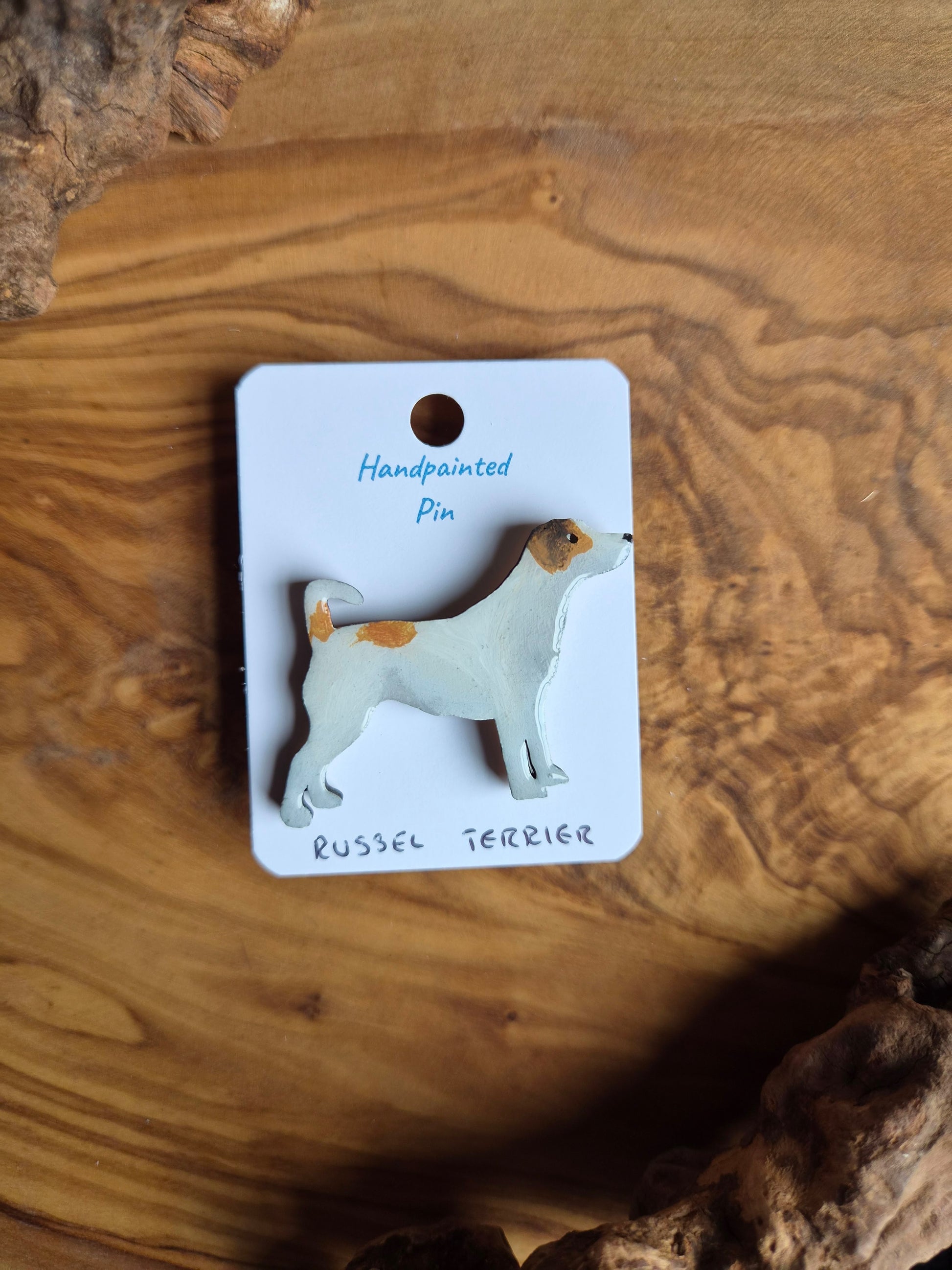 White and tan tri colour patches, hand-painted wooden pin badge of a Russel Terrier dog