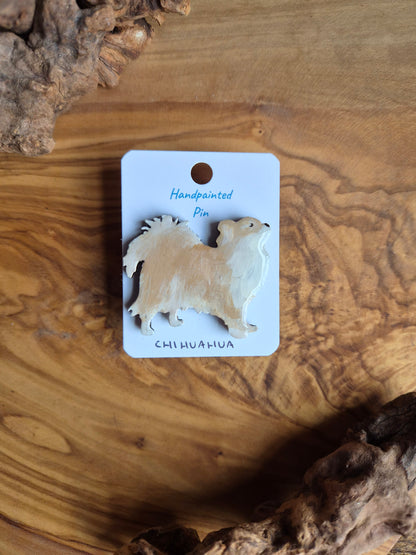 Hand-painted wooden dog pin badge of a longhaired fawn and white chihuahua